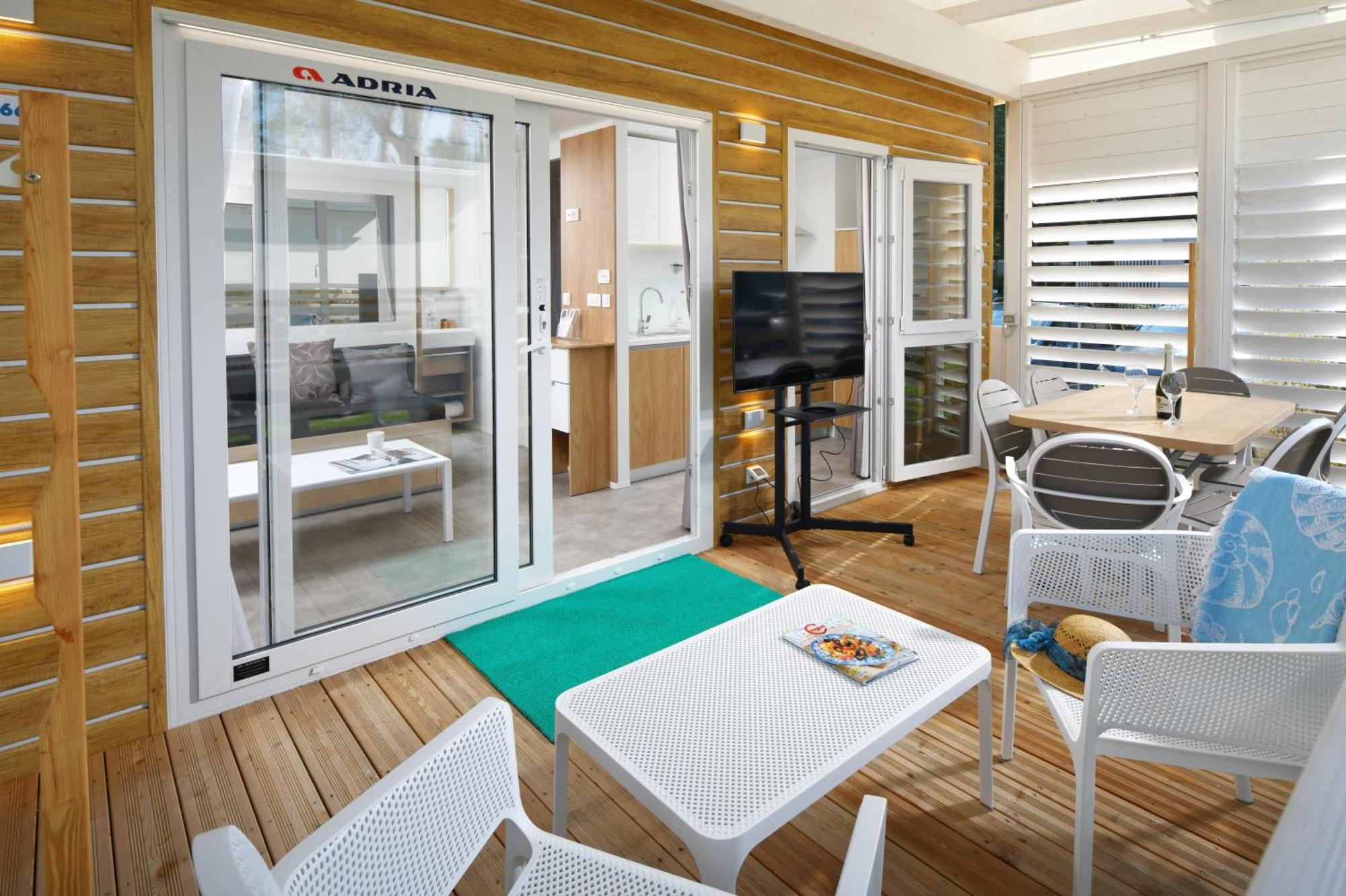 Barricata Holiday Village Scardovari Esterno foto A sliding door